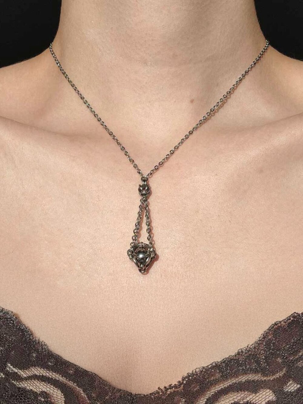 Classic vintage antique silver basket necklace with a small silver chain